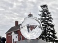 Two Harbors Lighthouse reflected in a lensball on a winter day  - PhotoDune Item for Sale