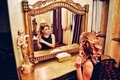 Beautiful luxury woman looking in a golden mirror - PhotoDune Item for Sale