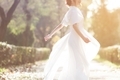 Bride is fun to pose in an airy, light wedding dress - PhotoDune Item for Sale