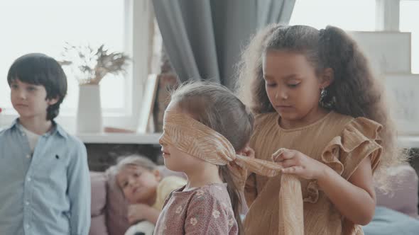 Slowmo of Children Preparing for Game of Tag