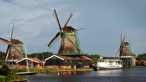 Windmills at Zaanse Schans in Holland on Sunset. Zaandam, Nether