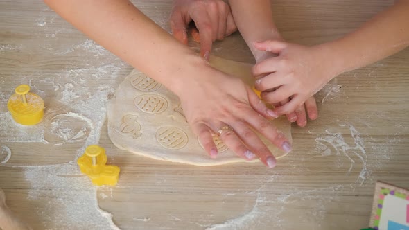 Close Up of Cutting Easter Cookies From a Dough
