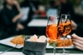 Aperol spritz cocktail on dinner table  - PhotoDune Item for Sale