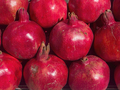 Group of pomegranates. Pomegranate closeup, background. - PhotoDune Item for Sale