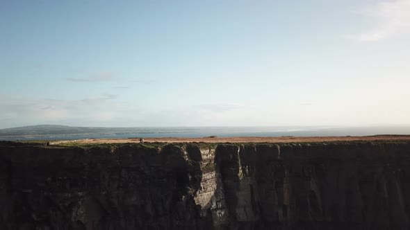 Top line of the high cliffs of Moher, sky panoramic, irish coast, drone aerial view