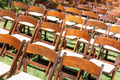 Rows of Wooden Event Chairs at Wedding Venue Abstract. - PhotoDune Item for Sale