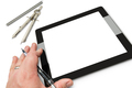 Male Hand Holding Mechanical Pencil on Blank Empty Computer Tablet. - PhotoDune Item for Sale
