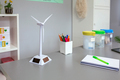 Solar windmill and selective trash bins over desk in classroom - PhotoDune Item for Sale