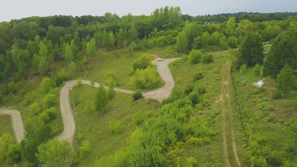 Drone Rises Up Shooting Park and Falls Down Turning on Grass