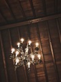 Chandelier hanging from a wooden ceiling - PhotoDune Item for Sale