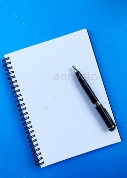 Empty white page with black pen on blue texture background