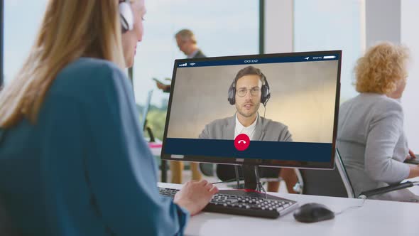 Woman having video call with man