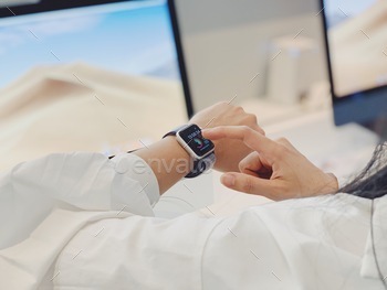 Woman using smart watch, wearable technology product