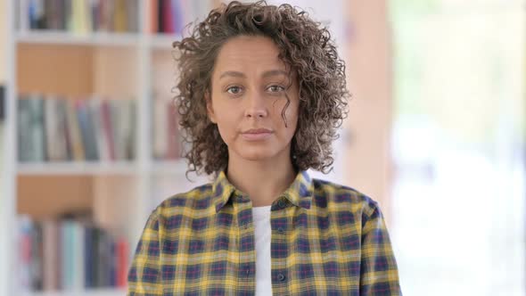 Portrait of Mixed Race Woman Looking at Camera