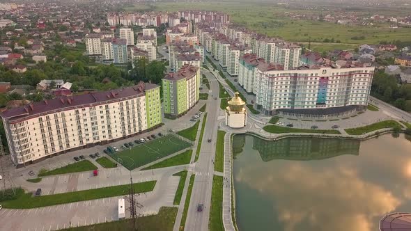 Aerial view of residential town area with apartment buildings and streets