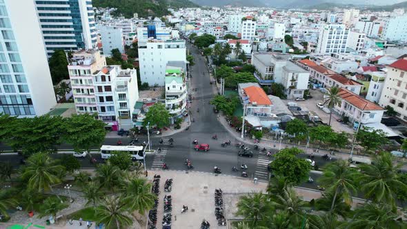 static aerial top down view of an intersection along the coastal road in Nha Trang Vietam located in