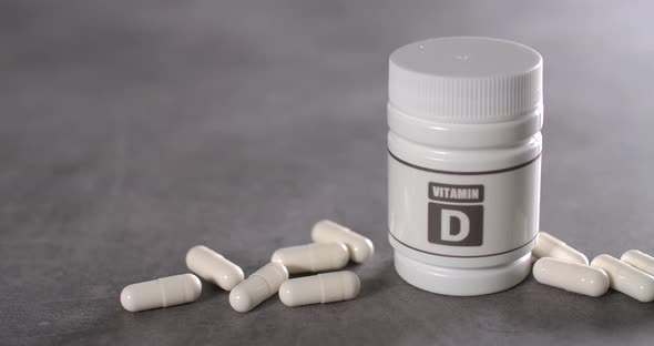 Vitamin D Capsules near the Box