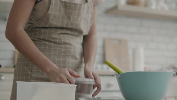 Woman Preparing Dough in the Kitchen