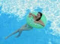 Girl in inner tube at the pool - PhotoDune Item for Sale