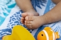 Baby feet on summer beach towel  - PhotoDune Item for Sale