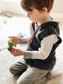 Young boy investigates a new toy using his imagination and learning new skills while playing  - PhotoDune Item for Sale