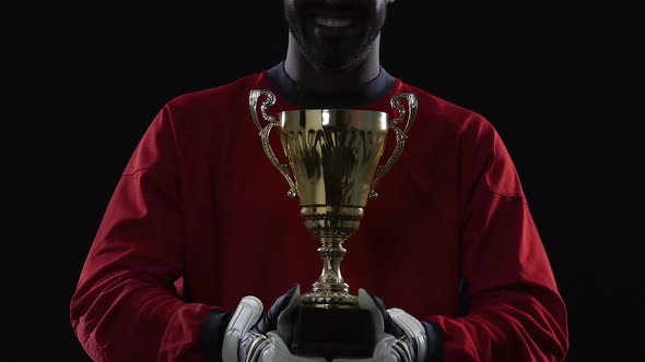 Smiling Football Champion With Prize, Celebration Ceremony, Perfect Results