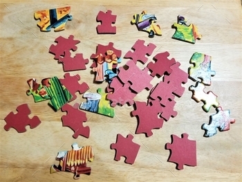  29th is National Puzzle Day.
Whether it’s a crossword, jigsaw, trivia, word searches, brain teasers or Soduku, puzzles put our minds to work. Studies have found that when we work on a jigsaw puzzle, we use both sides of the brain, and spending time daily working on puzzles improves memory, cognitive function and problem solving skills. Jigsaw puzzle in progress.