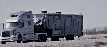  a 5th Wheel recreational vehicle travel trailer to the delivery destination.