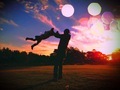 Dad swinging his little girl around at sunset  - PhotoDune Item for Sale