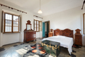 Bedroom in apartment interior in old country house in a sunny day - PhotoDune Item for Sale