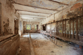 Messy storage, former stable with damaged walls in old country house - PhotoDune Item for Sale