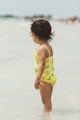 Baby girl standing in the water at the beach, Florida  - PhotoDune Item for Sale