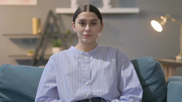 Portrait of Hispanic Woman Looking at the Camera