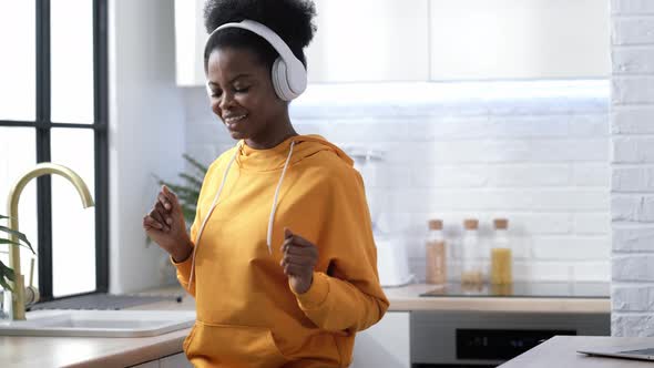 African American Black Handsome Woman Dancing with Headphones Enjoy Life Listening Favourite Music