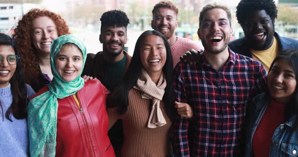 Young diverse people having fun outdoor laughing together - Diversity concept
