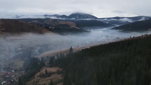 Winter Landscape Of The Carpathian Mountains In The Fog From A Bird's Eye View