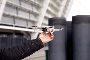 . exploring new building with innovative technology taking aerial photos and videos from above