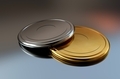 3D gold and silver medals or discs lying together on a mirror surface - PhotoDune Item for Sale