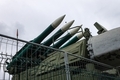 Missile launch rocket launcher behind fencing at a military base for hitting air targets - PhotoDune Item for Sale