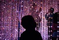 Toddler amused by the led lights display  - PhotoDune Item for Sale