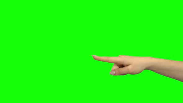 Arm of Female Pointing at Something. Chroma Key. Close Up