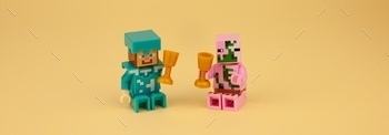 e. Hold glasses and drink Valentine’s day 8 March. Lego figures Minecraft little men Date, love celebrate concept. Ukraine, Kyiv – April 3, 202. Drink wine. Drinks.