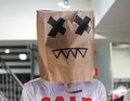 Mannequin with the paper shopping bag on his head.  - PhotoDune Item for Sale