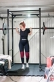 During lockdown young woman doing powerlifting in improvised home gym - PhotoDune Item for Sale