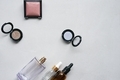 Cosmetic items for makeup on the white background flat lay. - PhotoDune Item for Sale