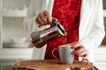 Pouring espresso coffee in to the cup. Morning ritual - PhotoDune Item for Sale