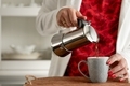 Pouring espresso coffee in to the cup. Morning ritual  - PhotoDune Item for Sale