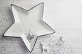 White star with text and silver glitter with Christmas decorations on the white background  - PhotoDune Item for Sale