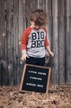 Big Brother Holding a Little Sister Sign - PhotoDune Item for Sale