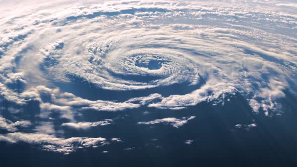 A View From Space Of A Large Hurricane In The Light Of A Moving Sun alt